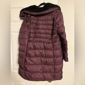 Large Micheal Kors down long coat. I worn it about ten times.